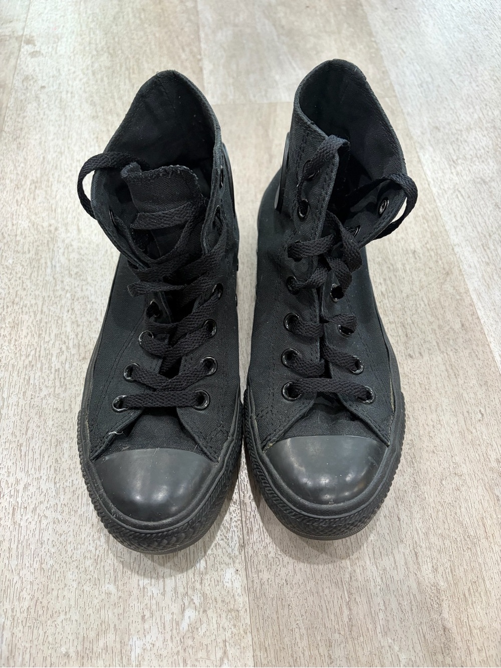 Black High-Top Converse Sneakers